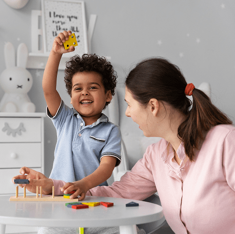 close-up-child-enjoying-didactic-game