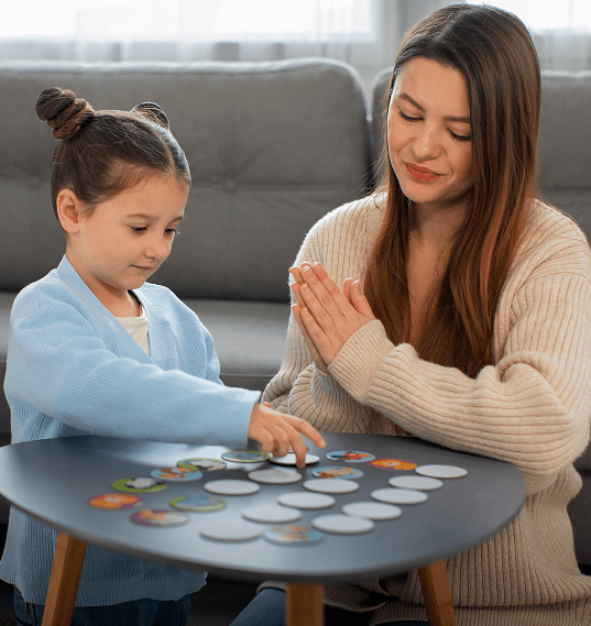 front-view-mother-girl-playing-game