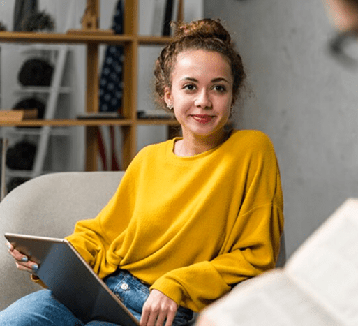 close-up-students-with-book-tablet-indoors