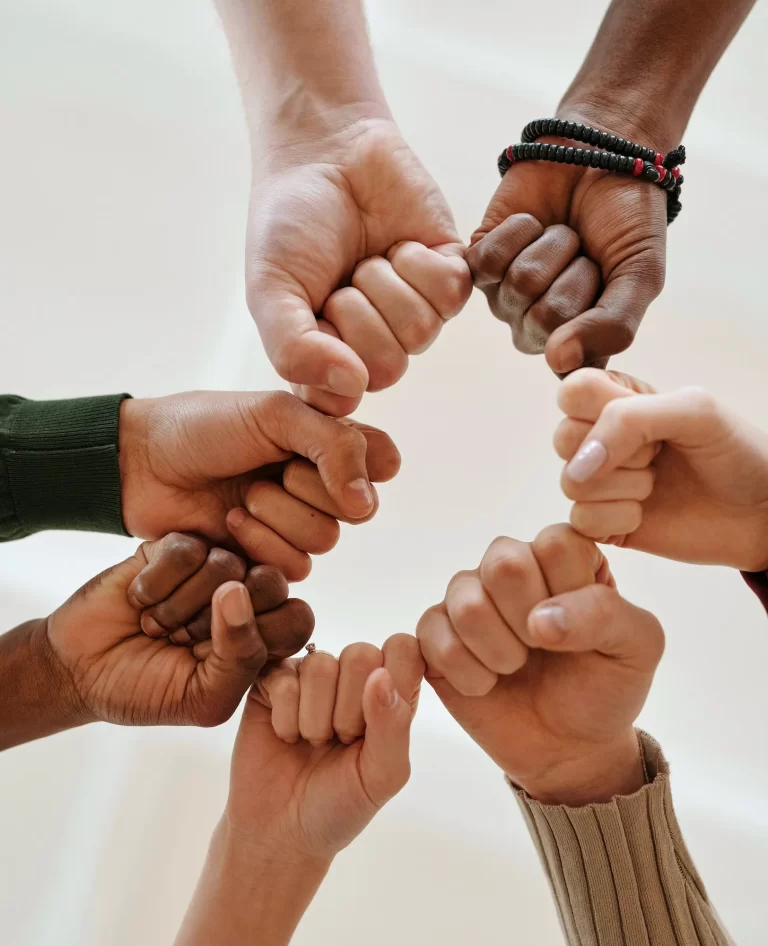 Hands coming together to show collaboration and togetherness